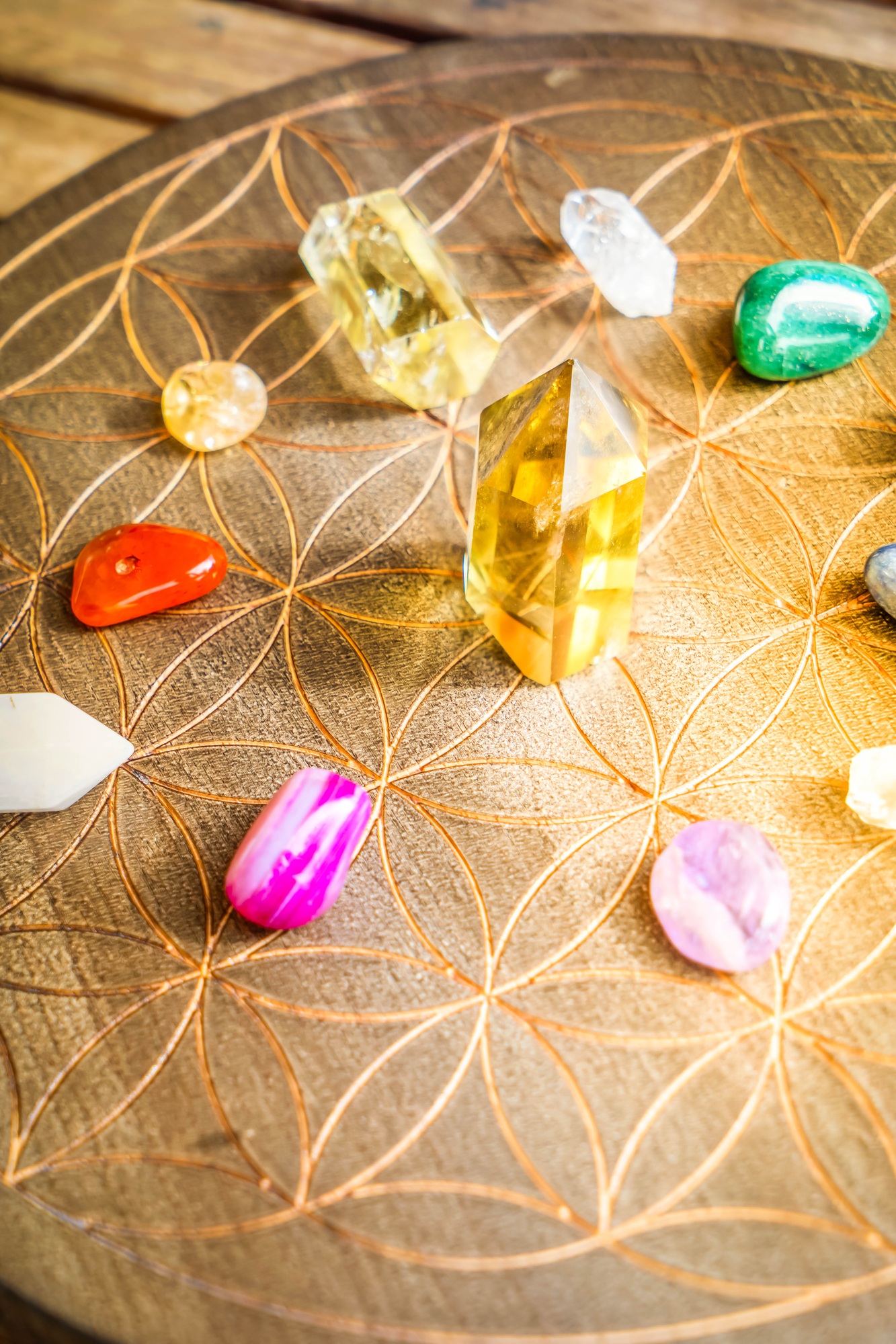 Healing crystals on brown background